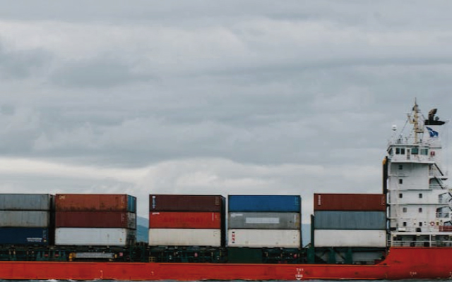 Unloading containers from a Toll truck